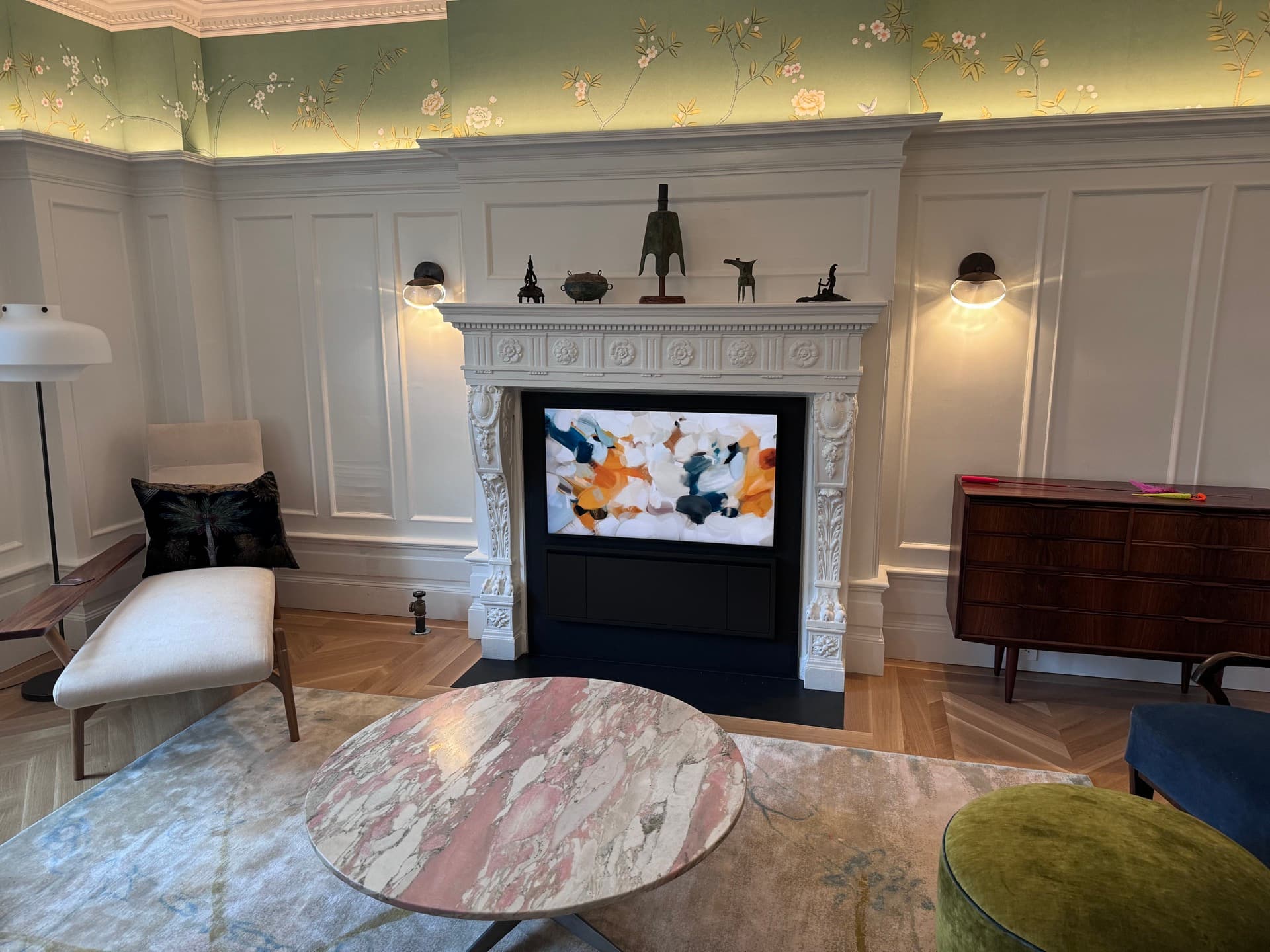Luxury living room with art display in ornate fireplace