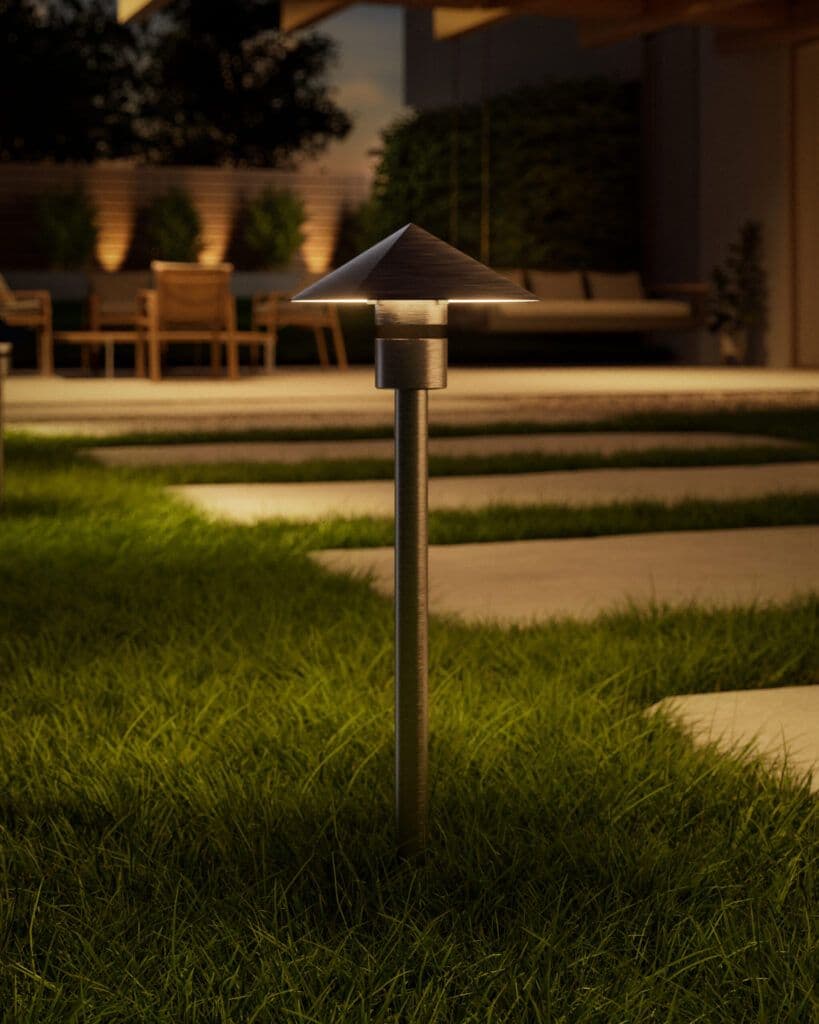 Coastal Source VIA path light on a lawn at dusk