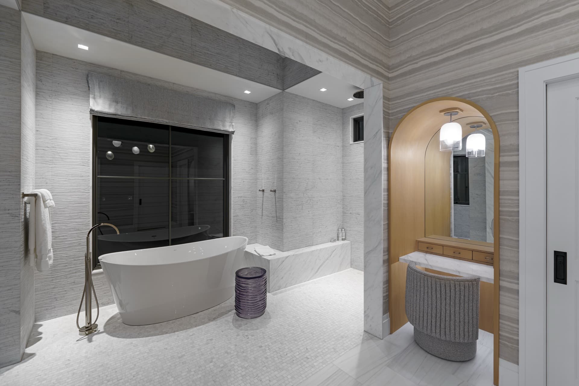 Marble bathroom with small-aperture recessed lighting